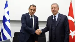 Nikolaos Panagiotopoulos ve Hulusi Akar