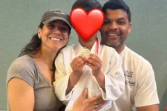 Joanna, o marido Luciano e o filho Caetano, de 6 anos