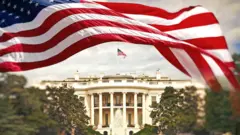 American flag in front of the White House in Washington D.C.