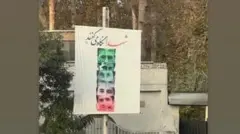 آسیه باکری خواستار برچیدن این پوستر از سطح شهر شده که حاوی عکس پدرش حمید باکری از فرماندهان کشته شده جنگ و ایران و عراق است