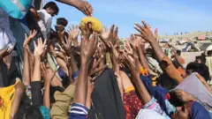 คนรับความช่วยเหลือ