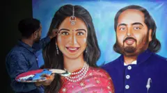 अनंत अंबानी आणि राधिका यांचे पेंटिग करताना पेंटर.