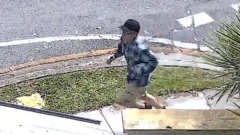 Australian police are working with their international counterparts to locate a man they believe fled the country after pouring boiling coffee on a baby in Brisbane.
