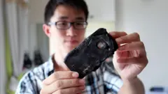 বিস্ফোরণে পুড়ে যাওয়া একটি ফোন।