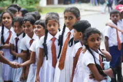 School children attend a field trip to the Royal Botanical Gardens in Peradeniya, Sri Lanka. 