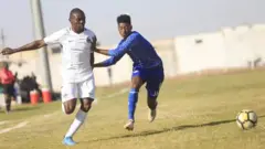 சூடான் போர் - தப்பிய கால்பந்து வீரர்