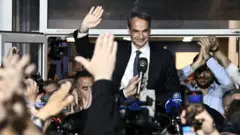 Prime Minister and New Democracy party's leader Kyriakos Mitsotakis celebrates with his supporters