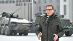 Polish Prime Minister Mateusz Morawiecki at a news conference during a visit to the 18th Mechanised Division in Siedlce, eastern Poland, on 30 January 2023
