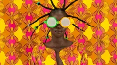 Woman disguised by colourful fabric
