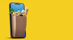 Ilustração mostra celular com cesta de compras saindo da tela