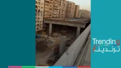 "كوبري في البلكونة"..جسر يخترق شرفات البنايات السكنية ويثير صدمة بين المصريين