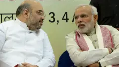 નરેન્દ્ર મોદી અને અમિત શાહ
