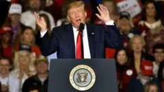 President Donald Trump mocks Beto O"Rourke in Mississippi