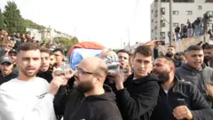 تشييع جثامين شبان فلسطينيين في طولكرم