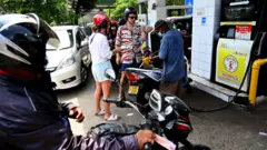 foreigners in fuel queues