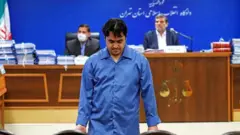 روح الله زم در دادگاه