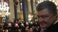 томос