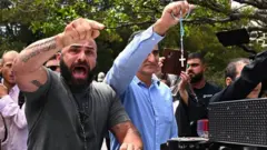 اشتباكات بين المتظاهرين والمشيعين خلال جنازة جورج بيل في سيدني