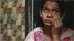 మహిళ