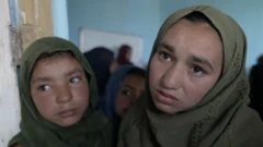 12-year old Parwana with a friend