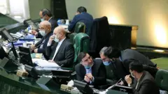 اعتراض شدید مجلس ایران به توافق دولت روحانی با آژانس