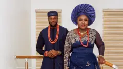 Stan Nze and e wife blessing