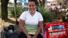 Danexi Andrade selling sweets in Medellin