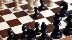 Chess pieces on a board