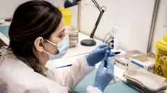 The AstraZeneca vaccines are stored and prepared for vaccination at the Region Hovedstaden"s Vaccine Center in Bella Center in Copenhagen, Denmark, 11 February 2021