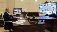 Путин