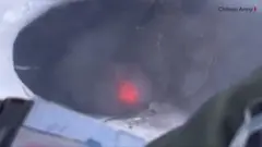 Crater of Villarrica volcano seen from a helicopter