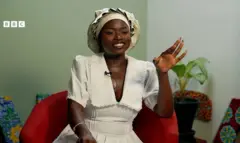 Sister Agnes speaking to the camera