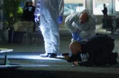 Kriminalpolizei am Tatort.