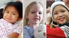 Ana, Viktoriia, and Khalil - Ana has dark hair and hospital pjs on, Viktoriia is wearing a blue top and holding a teddy bear and Khalil is wearing a red, white and blue top and has a hat on. All of them are smiling.