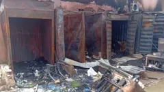 Aworan die lara awọn ṣọọbu to jona