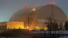 Укриття ЧАЕС з пошкодженням на верхівці