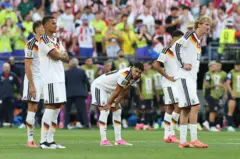 Jogadores da Alemanha tristes após eliminação