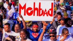 Friends and families hold candle procession for Mohbad
