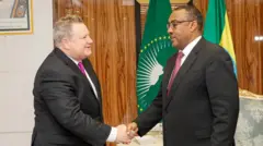 አምባሳደር ማይክ ሐመር ከምክትል ጠቅላይ ሚኒስትር እና የውጭ ጉዳይ ሚኒስትር ደመቀ መኮንን