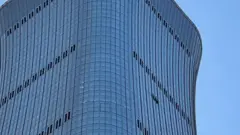 The collision left holes on the side of the CITIC Tower