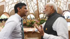 मोदी सुनक