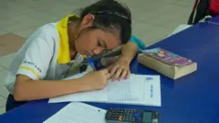 Singapurlu test çözen çocuk