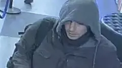 Фото подозреваемого, сделанное камерой наружного наблюдения
