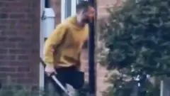 A man carrying a sword
