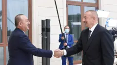 Министр иностранных дел Турции Мевлют Чавушоглу, президент Азербайджана Ильхам Алиев