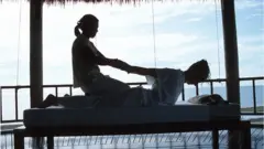বডি ম্যাসাজ।