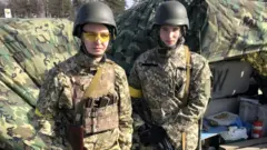 Maksym Lutsyk,19 (L) and Dmytro Kisilenko, 18