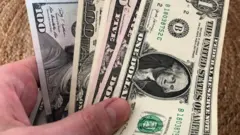 Наличные доллары