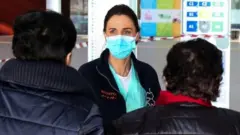 Healthcare professionals at work at the hospital of Schiavonia, northern Italy, 8 March 2020