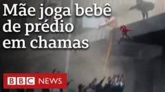 Mãe joga bebê de prédio em chamas na África do Sul